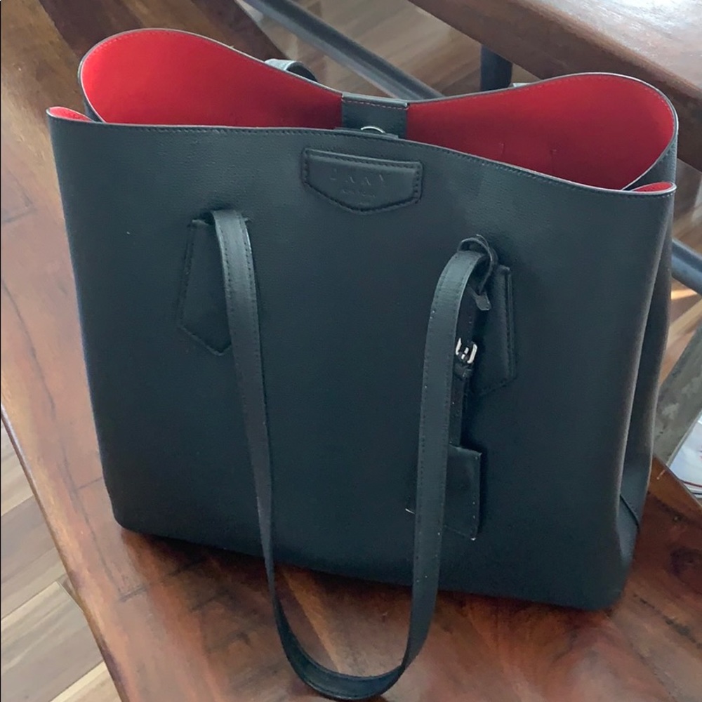 DKNY black/red tote ALMOST NEW. Great condition